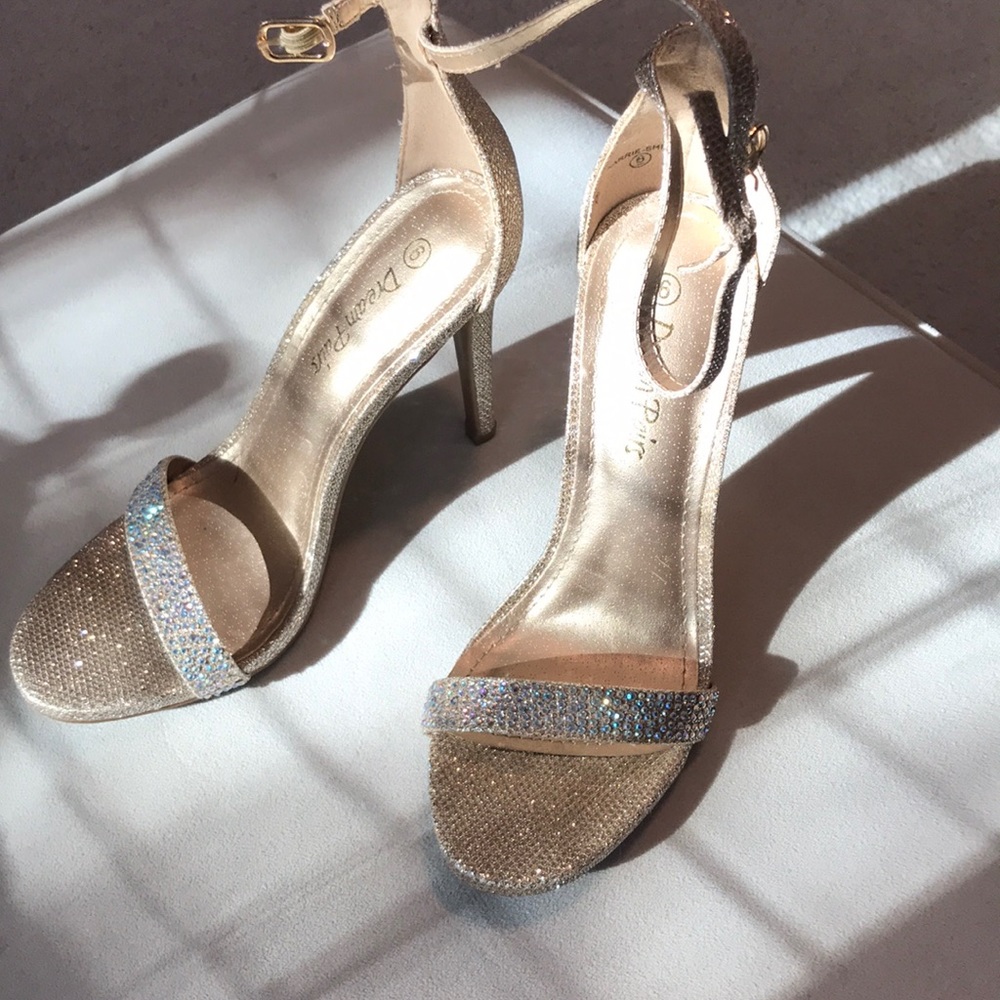 High stiletto Dream Paris gold shimmer shoes.